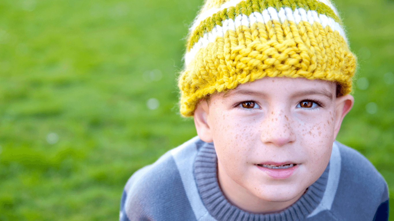 Boy in yellow beanie hat